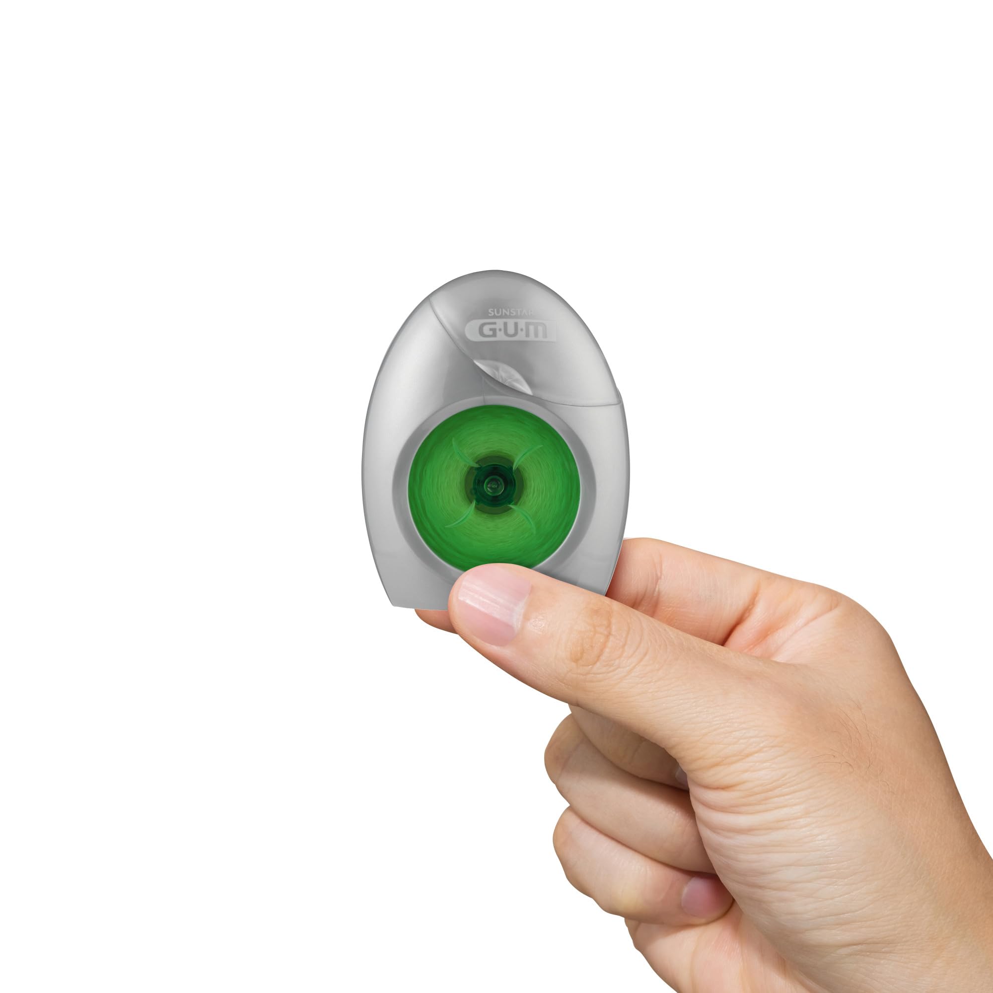 Floss sliding between teeth demonstrating woven structure