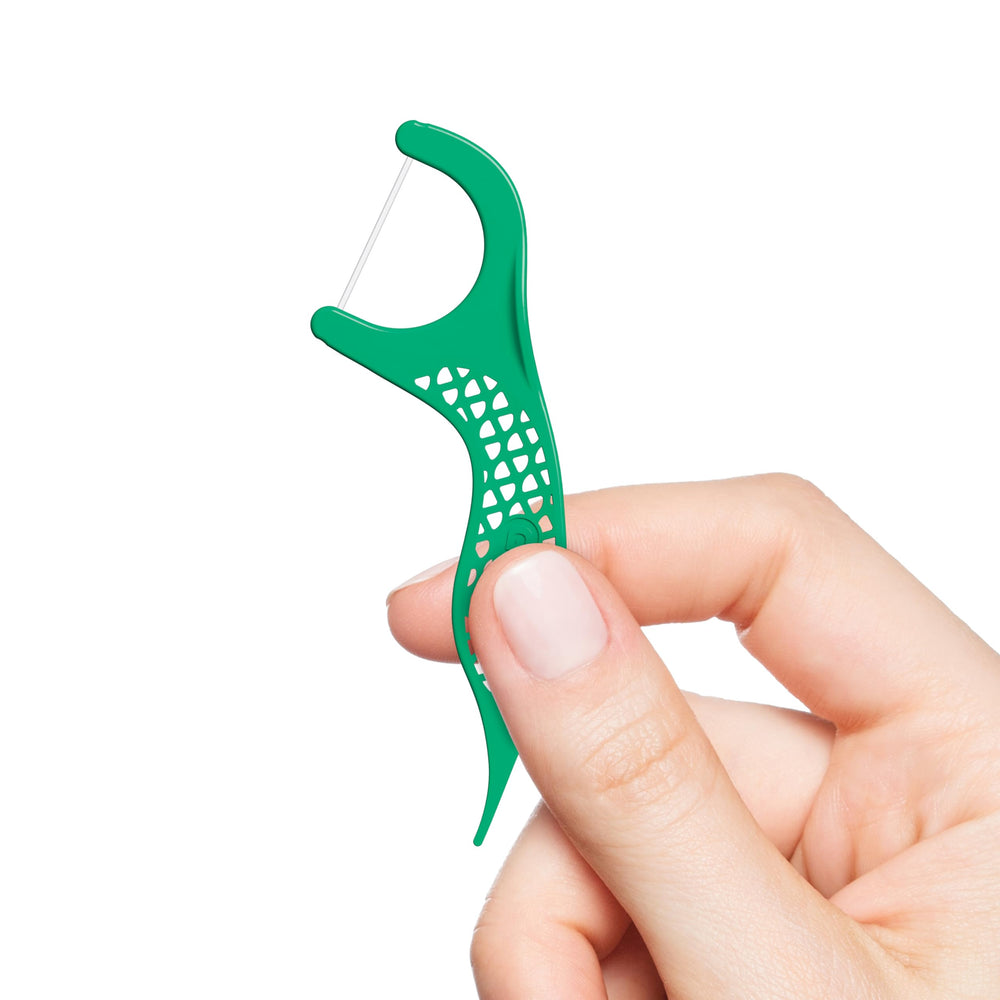 GUM floss picks on display in store