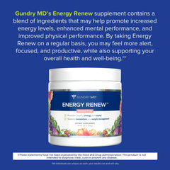 Energy Renew capsules next to a glass of water