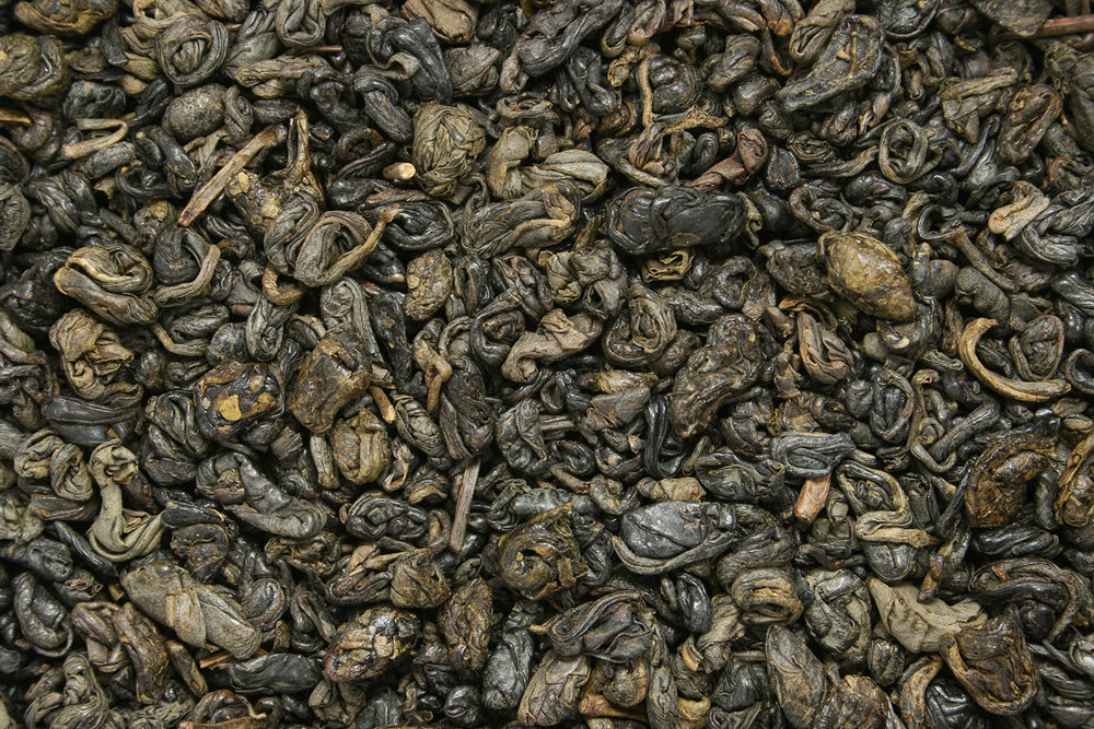 Brewing gunpowder green tea in a teapot