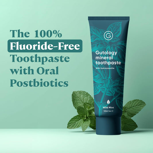 Close-up of Gutology probiotic toothpaste tube with Wild Mint flavor