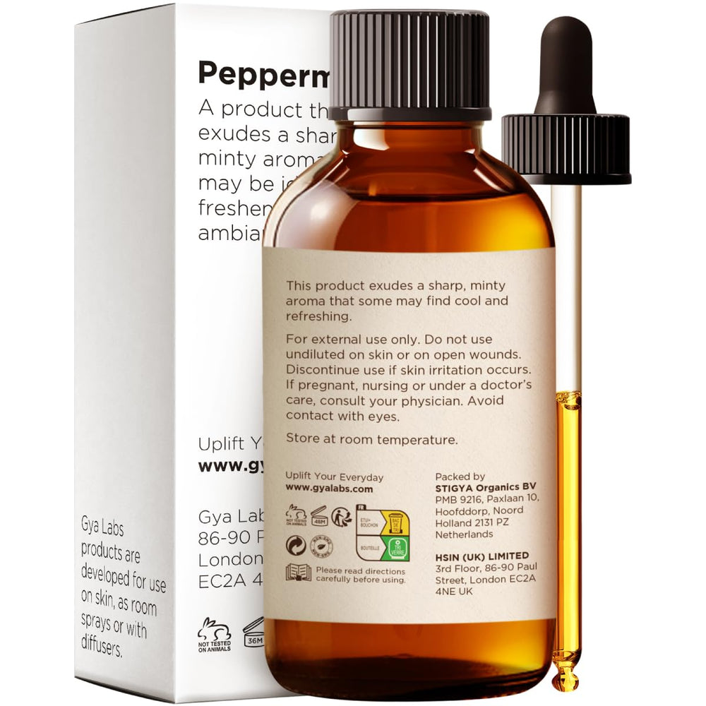 Gya Labs Peppermint Essential Oil hair care application for a cooling scalp ritual.