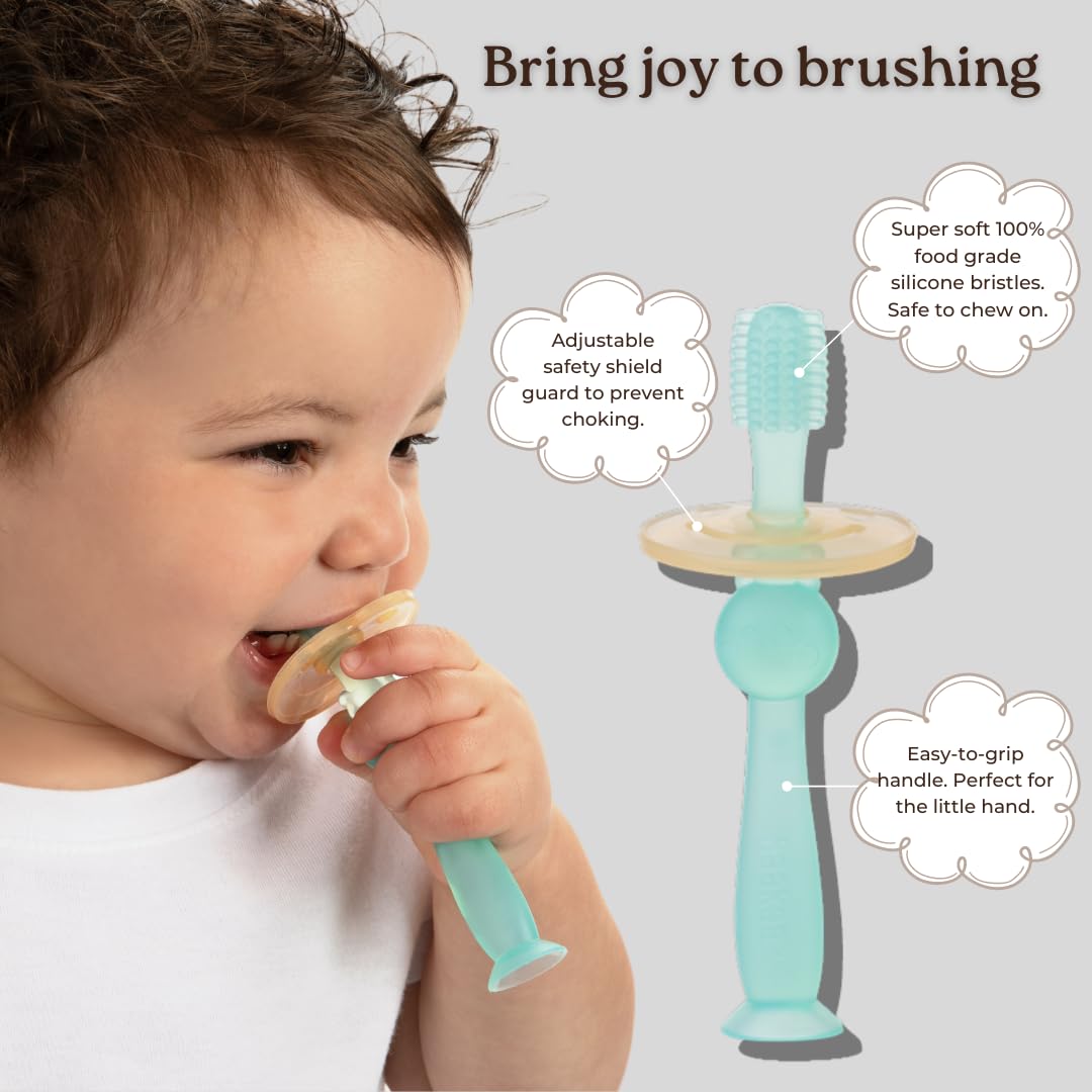 Haakaa 360° silicone baby toothbrush pink with suction base