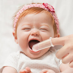 Soft bristles on the front for cleaning infant teeth