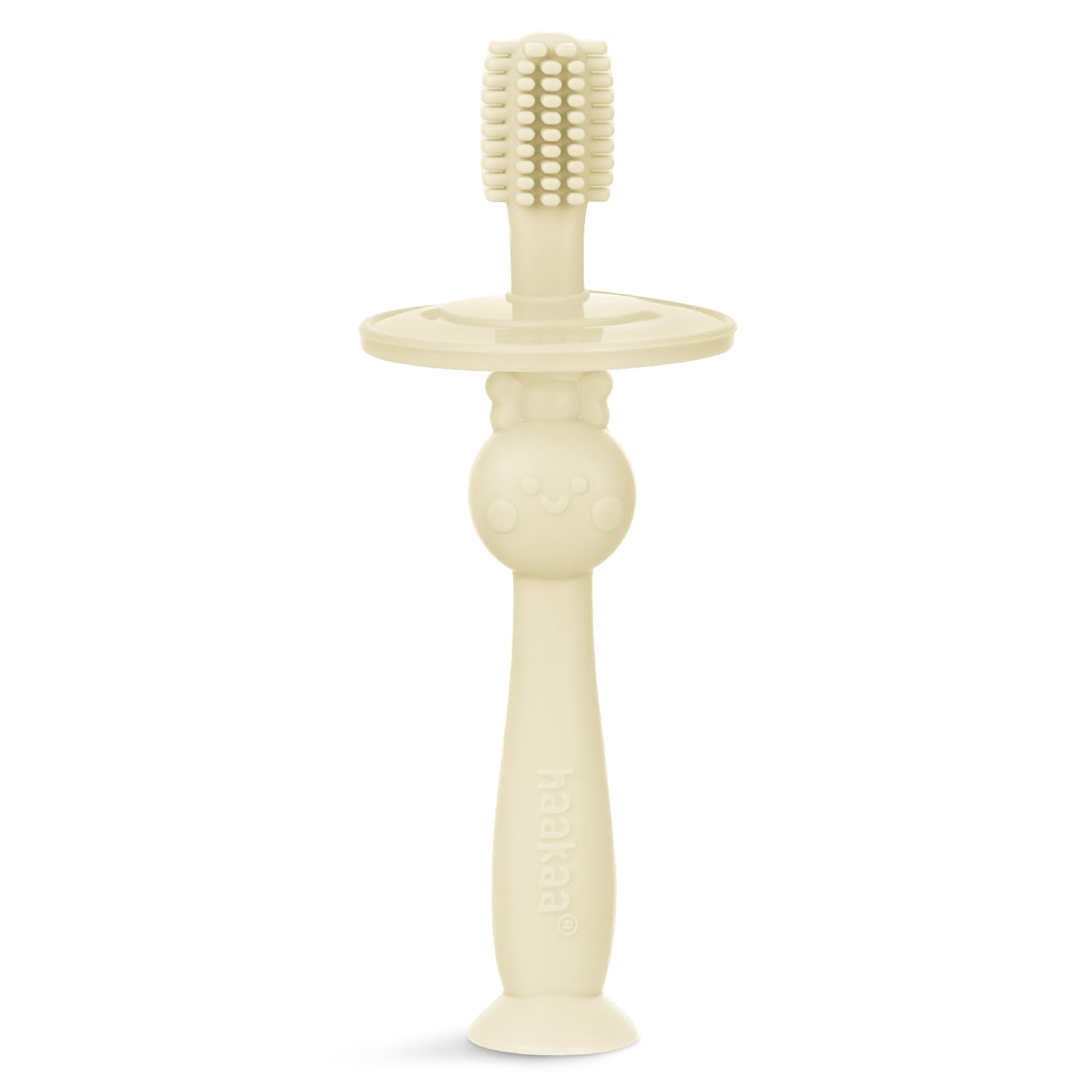 Cream Haakaa infant toothbrush with 360° bristle coverage