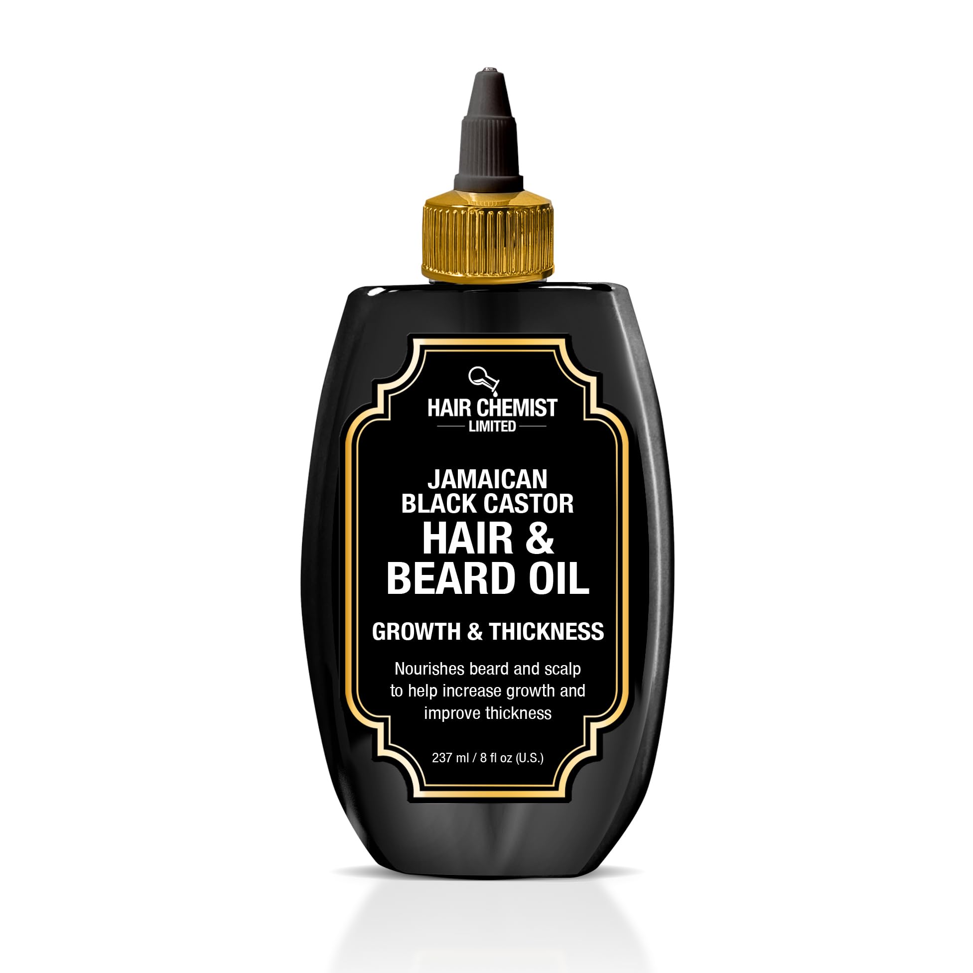 Hair Chemist Growth and Thickness oil bottle close-up, showcasing nourishment.