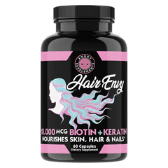 Close-up of Hair Envy AM capsules bottle