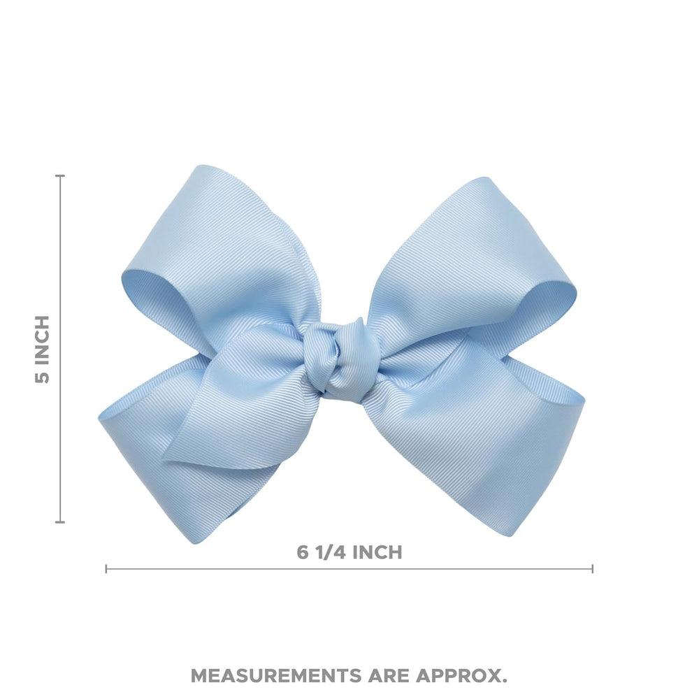 HAIRBOWS Knot-wrap center bow worn daily; complements many outfits.