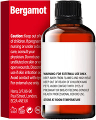 Bergamot essential oil for hair care being massaged onto scalp