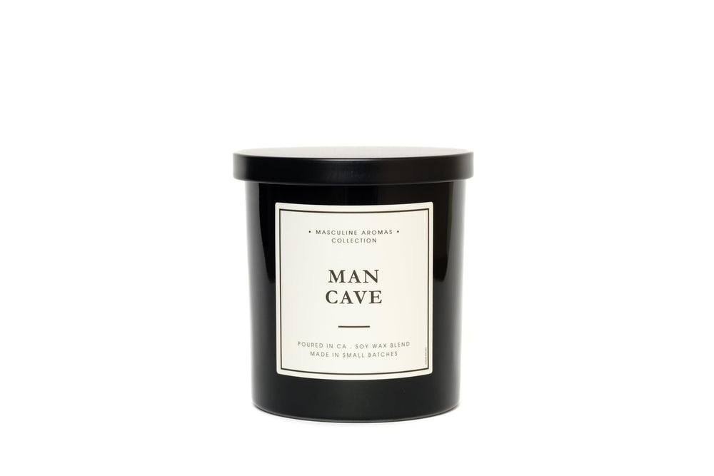 9oz masculine candle hand-poured in California with a woodsy scent
