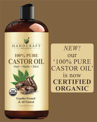 Flat lay of castor oil bottle and beauty tools