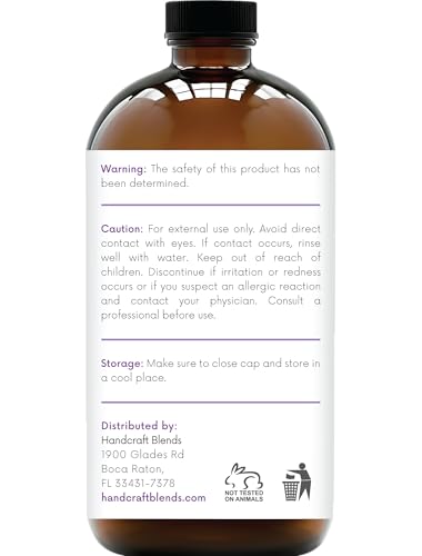 Clear glass bottle of lavender essential oil with dropper cap