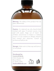 Clear glass bottle of lavender essential oil with dropper cap