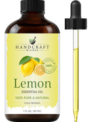 Amber glass bottle of Handcraft Blends Lemon Essential Oil with dropper
