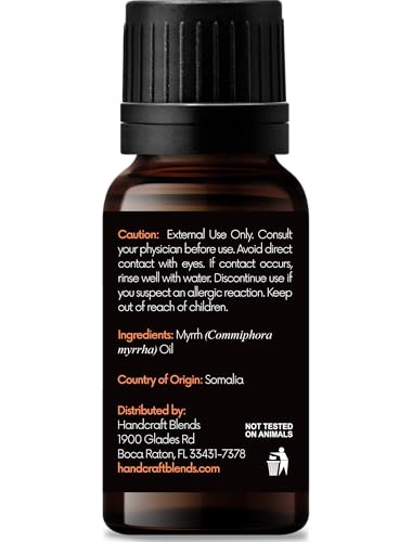 Close-up of the amber bottle dropper for Myrrh essential oil