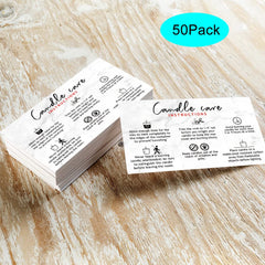 Flat lay of marble look candle care instructions next to candles