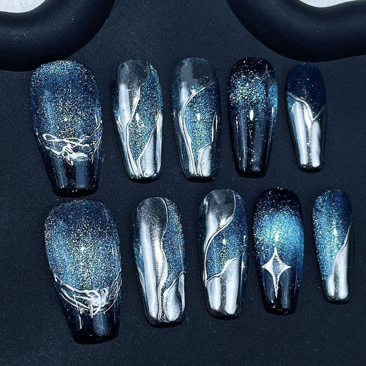 Handmade blue-gradient coffin press-on nails for a salon-like at-home look.