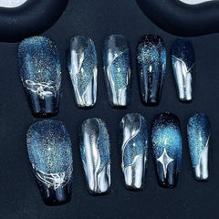 Handmade blue-gradient coffin press-on nails for a salon-like at-home look.