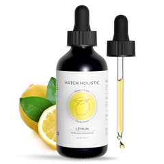 4oz bottle of Hatch Holistic Lemon Essential Oil in a glass bottle