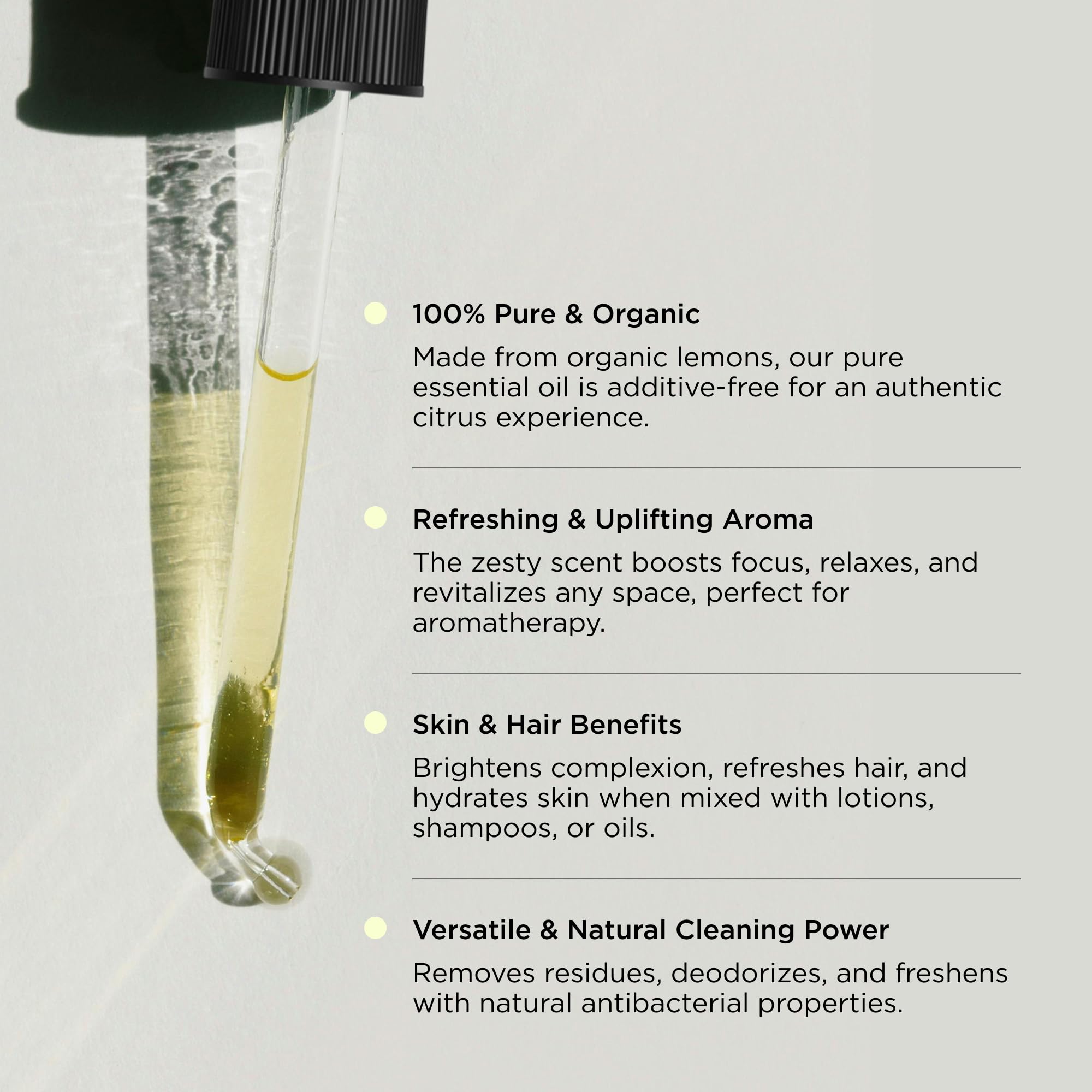 Lemon essential oil bottle with lemon imagery for Hatch Holistic