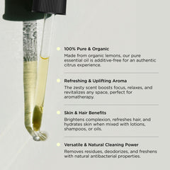 Lemon essential oil bottle with lemon imagery for Hatch Holistic