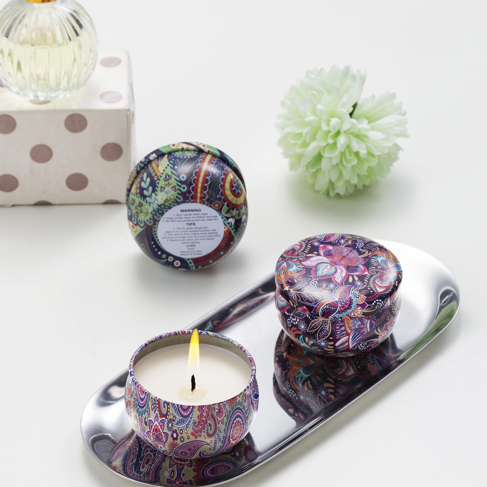 Hausware three tins arranged to show scent variety and thoughtful gift presentation