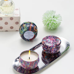 Hausware three tins arranged to show scent variety and thoughtful gift presentation