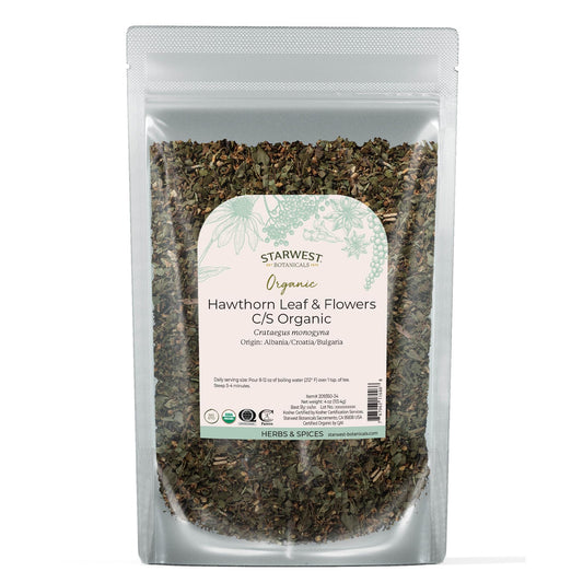 Dried hawthorn leaves and small white flowers in a loose leaf blend