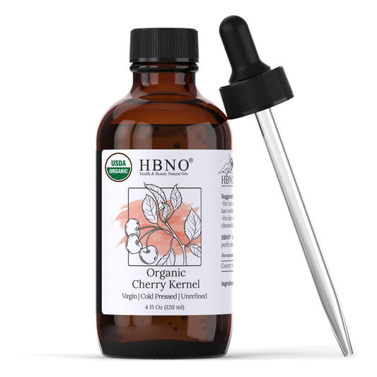 HBNO Organic Cherry Kernel Oil bottle front highlighting hydration for skin and hair care.