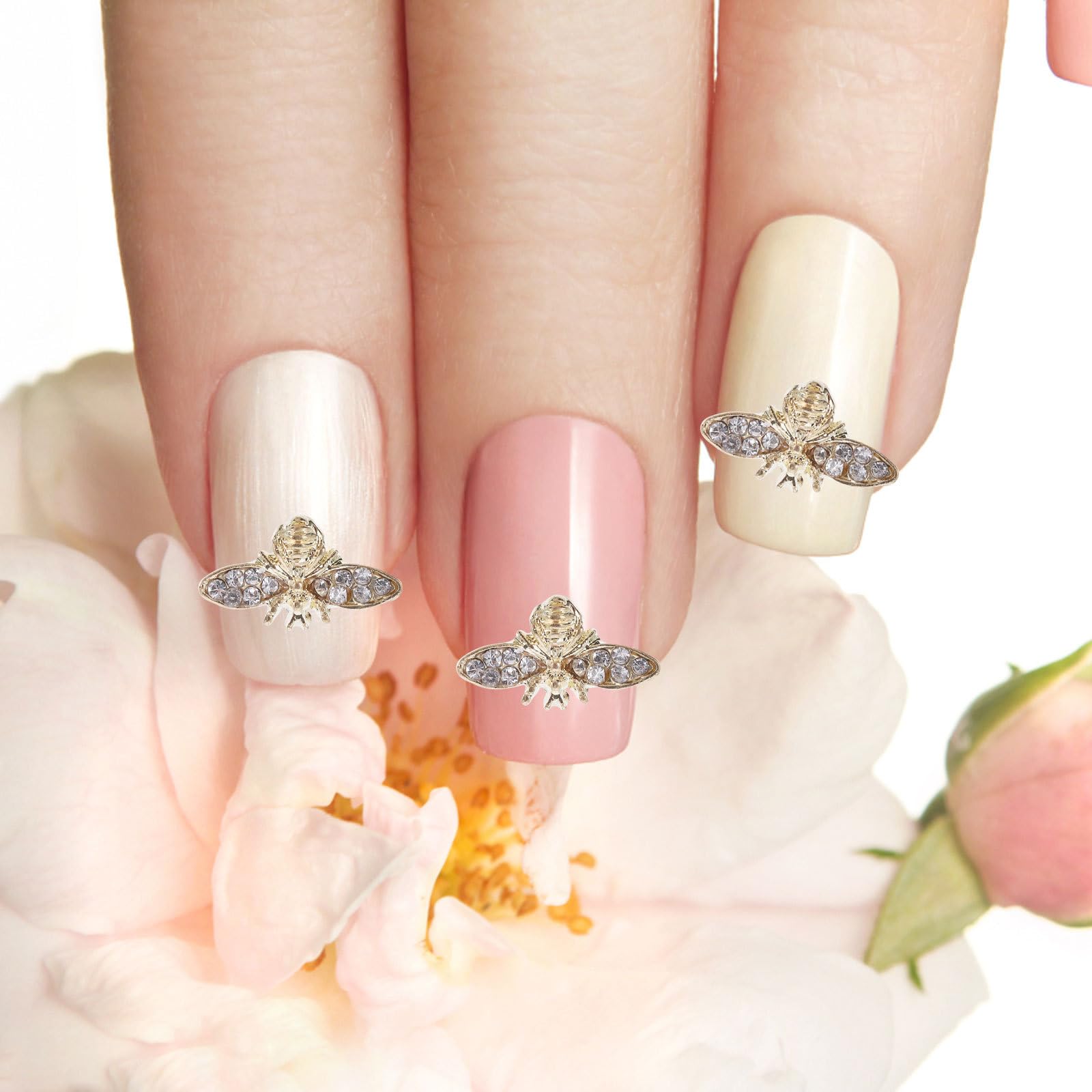 Healeved bee charms simplify application for at-home or salon nail art.