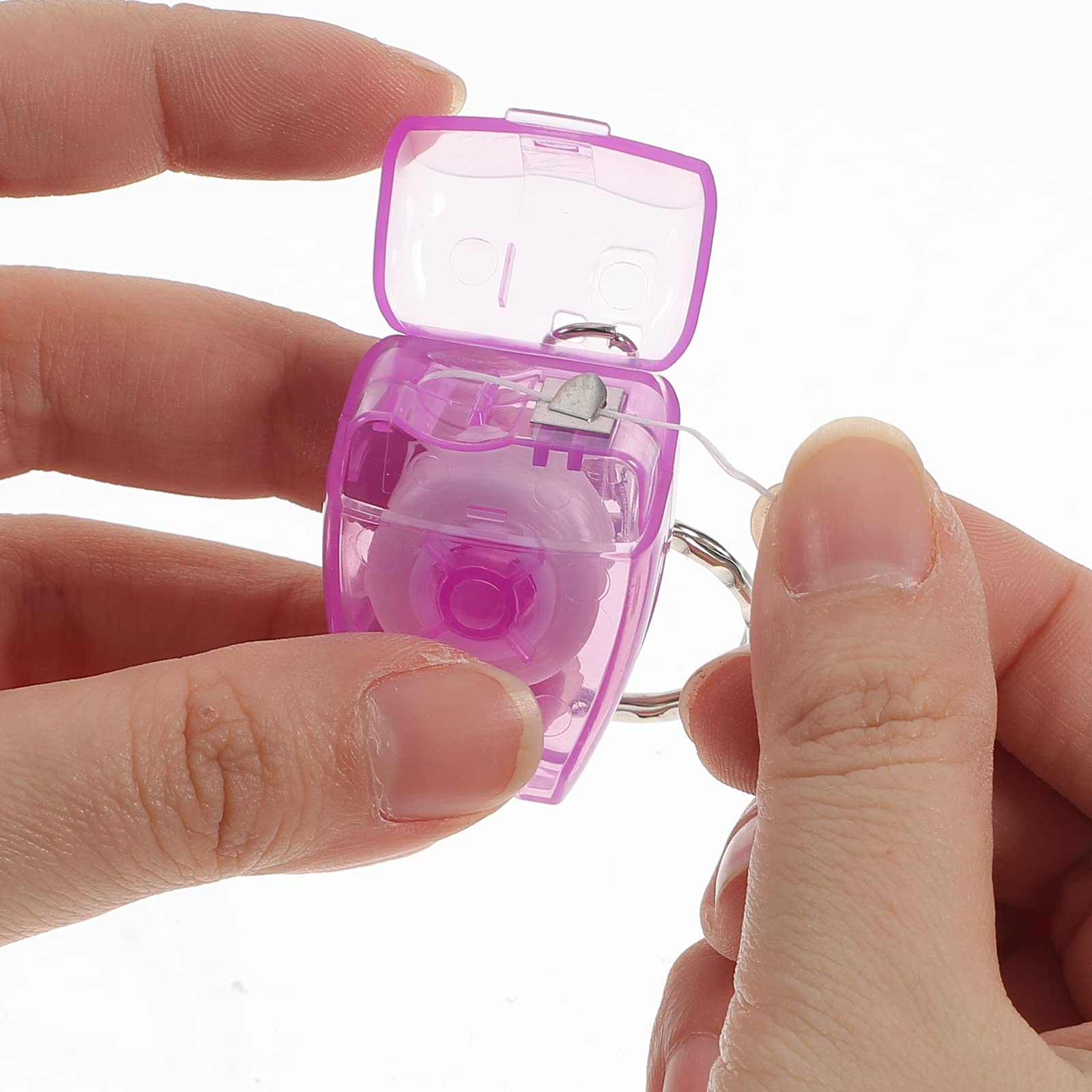 Pocket-sized dental floss in a keychain case