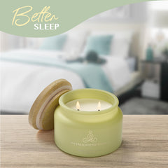 Healing candle lit with soft glow in a calm setting.