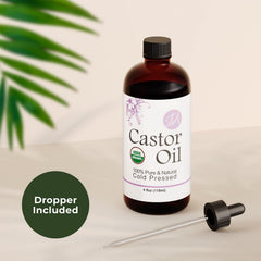 Healing Solutions Castor Oil on eyebrows supporting natural growth.
