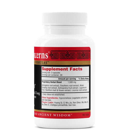Close-up of Astra 8 capsules with astragalus and ginseng herbs