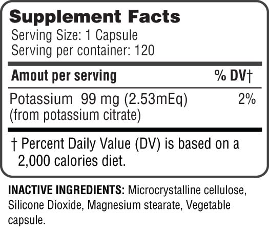 Glass of water beside Health Potassium Citrate bottle