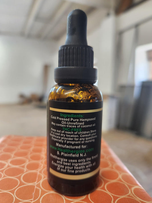 Premium hemp oil bottle label showing non-GMO and USA-made