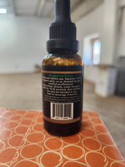 Premium hemp oil bottle on a countertop with natural lighting