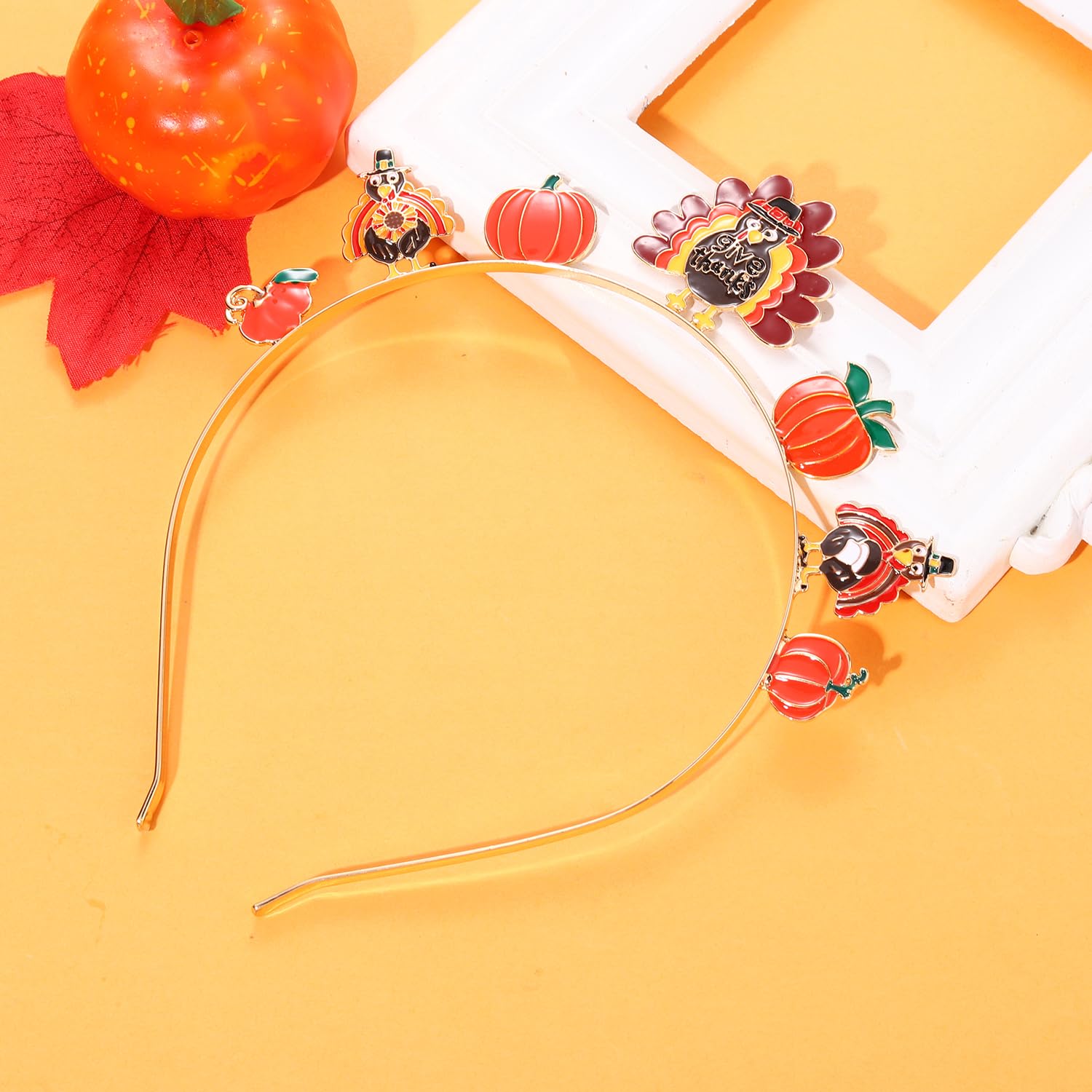 HEIDKRUEGER autumn headband in orange, yellow, brown enhances outfits