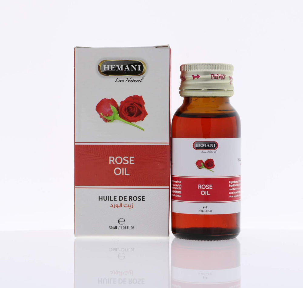 Hemani Rose Oil being used for a massage