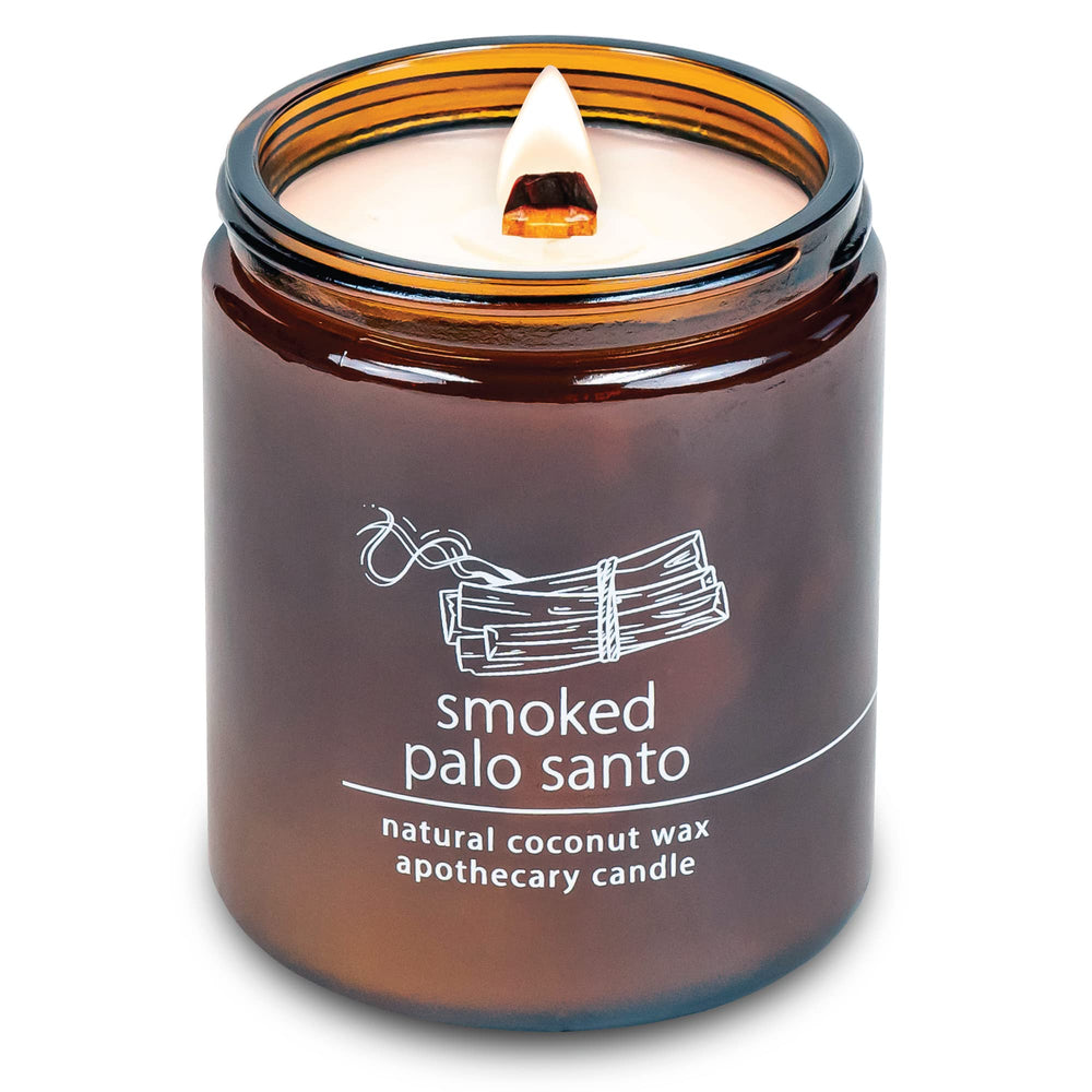 Hemlock Park candle in amber glass jar with wooden wick