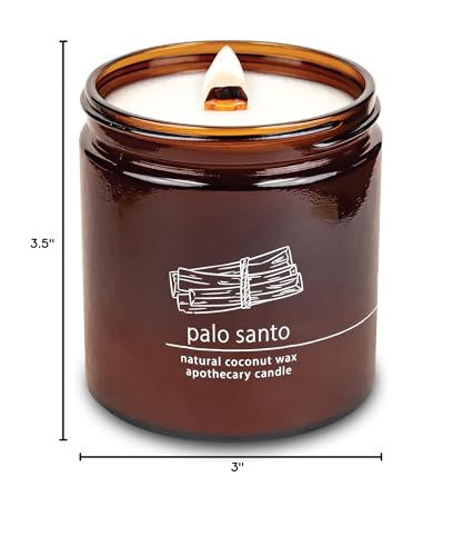 Candle burning with warm glow and crackling wick