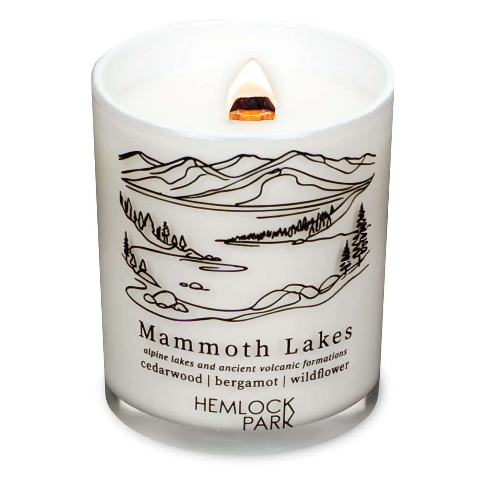 Hemlock Park travel inspired candle with crackling wood wick in a white glass jar (7.2 oz) from Mammoth Lakes