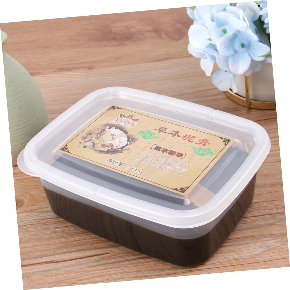 Opened Hemoton moxibustion mud container showing compact size