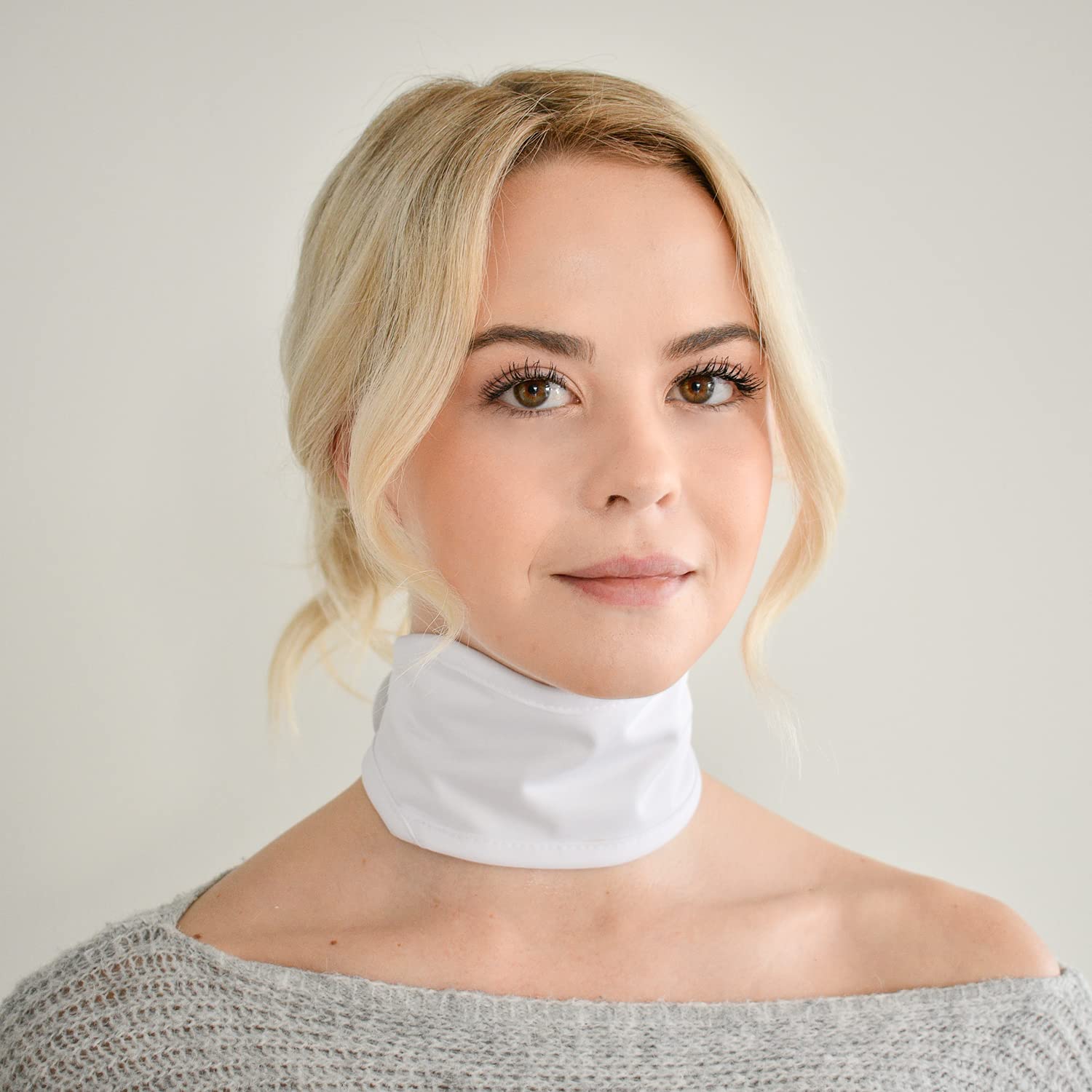 Henhecy Castor Oil Neck Wrap laid flat showing soft cotton exterior