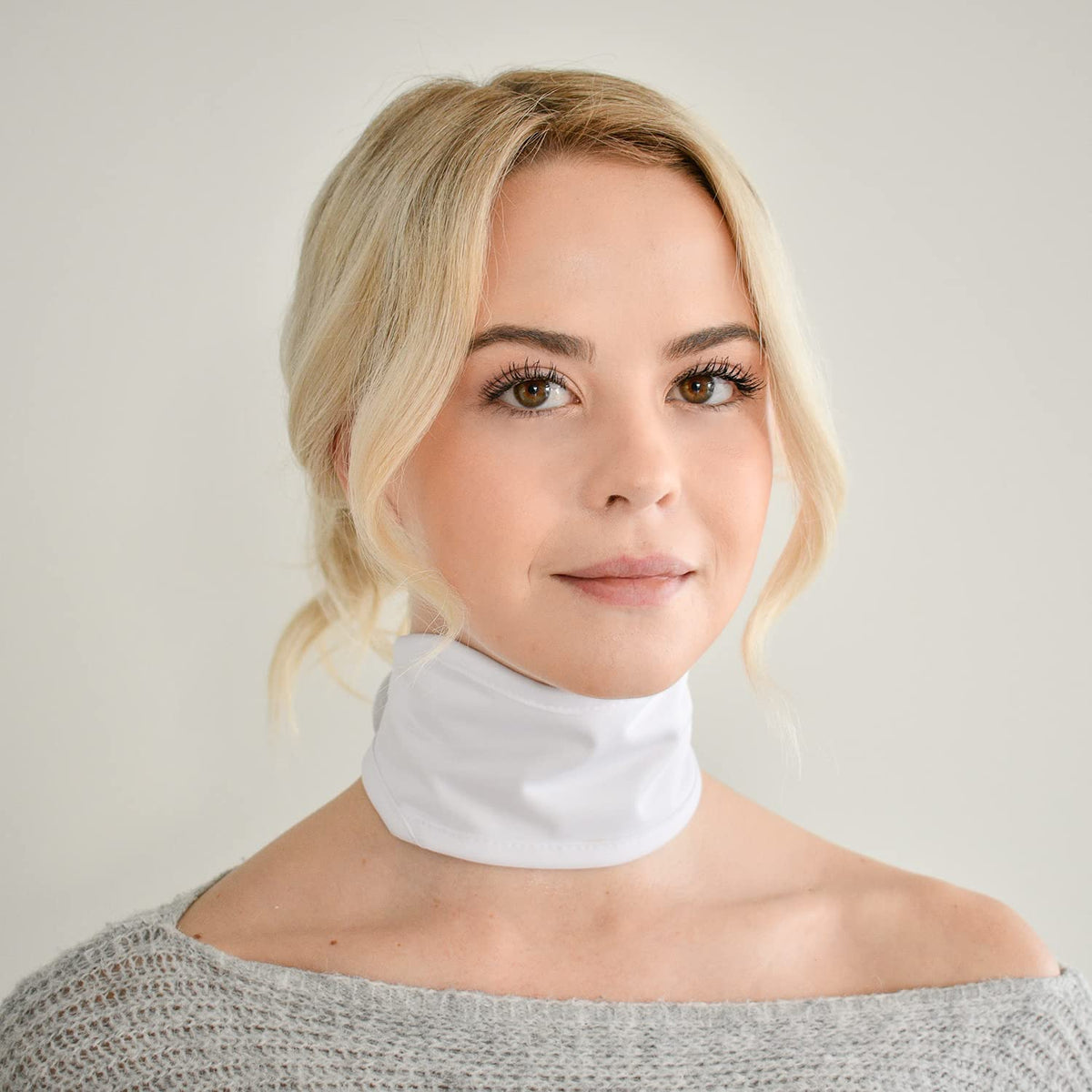 Henhecy Castor Oil Neck Wrap laid flat showing soft cotton exterior