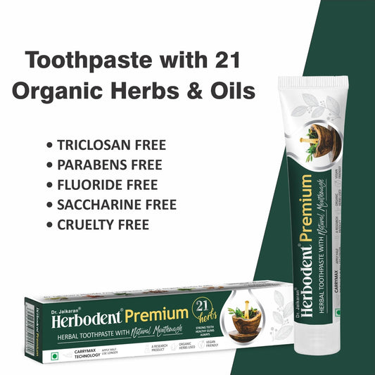 Herbodent Premium Toothpaste tube displaying 21 organic herbs