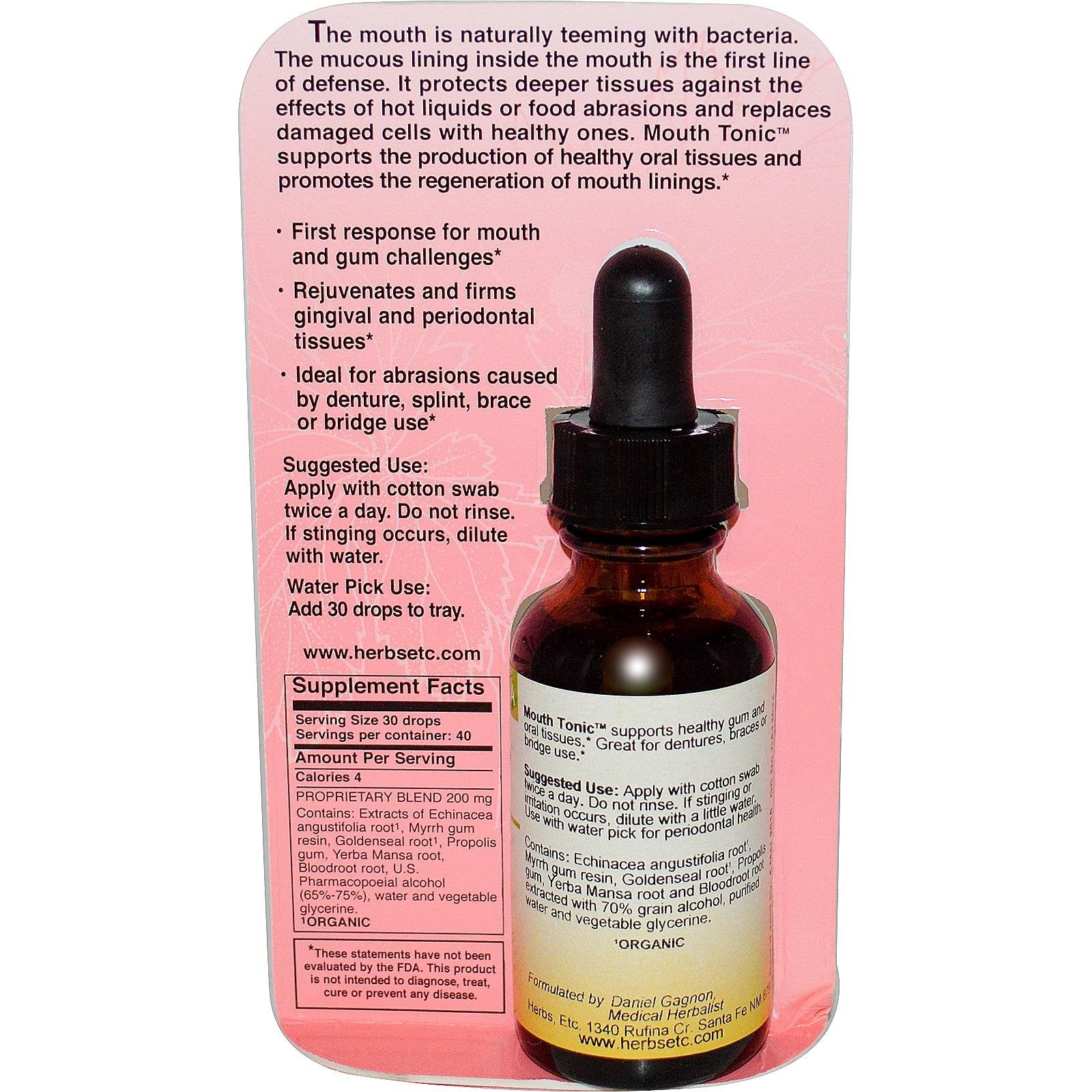 Applying Herbs Etc. Mouth Tonic with cotton swab for oral care