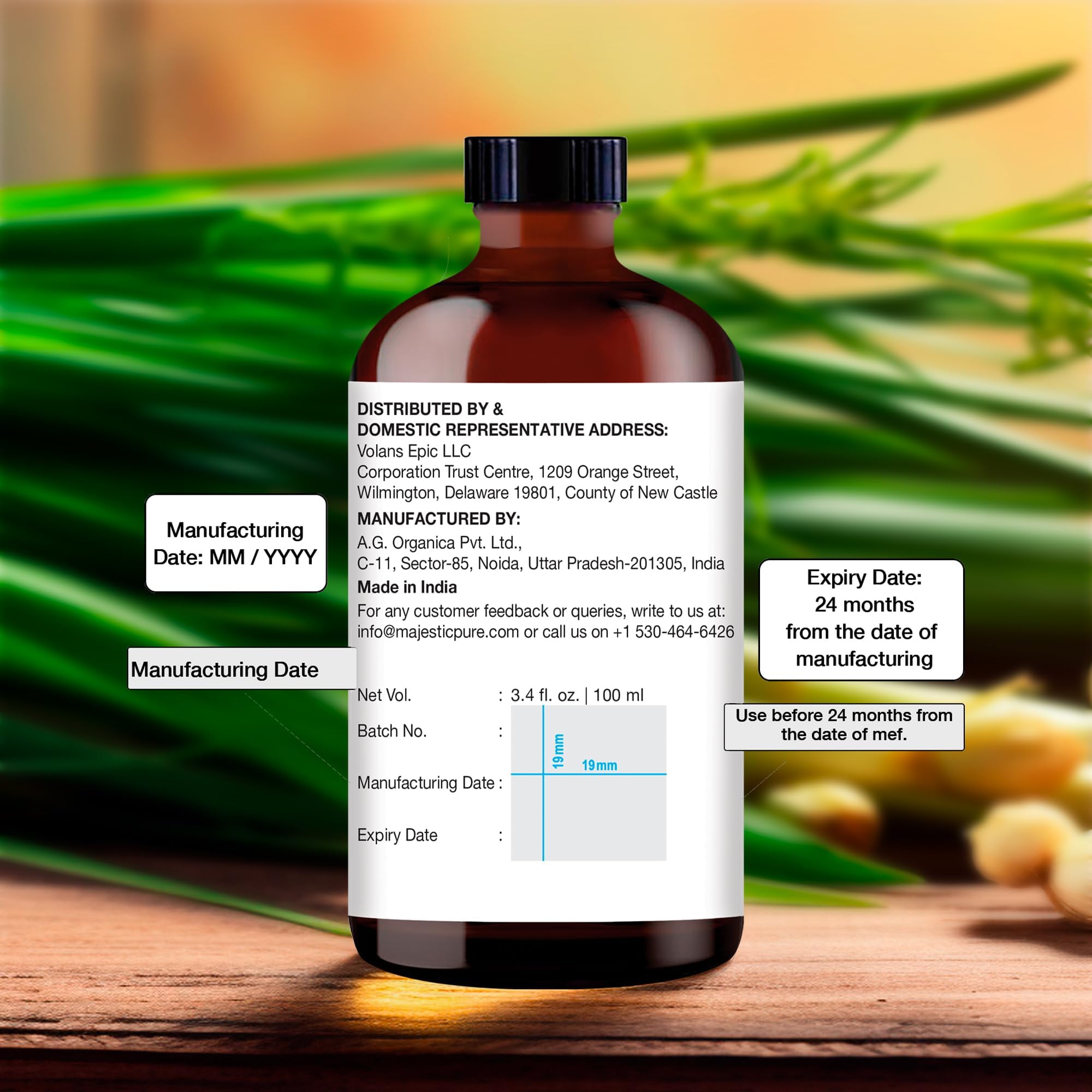 Amber glass bottle containing Majestic Pure Lemongrass Essential Oil.