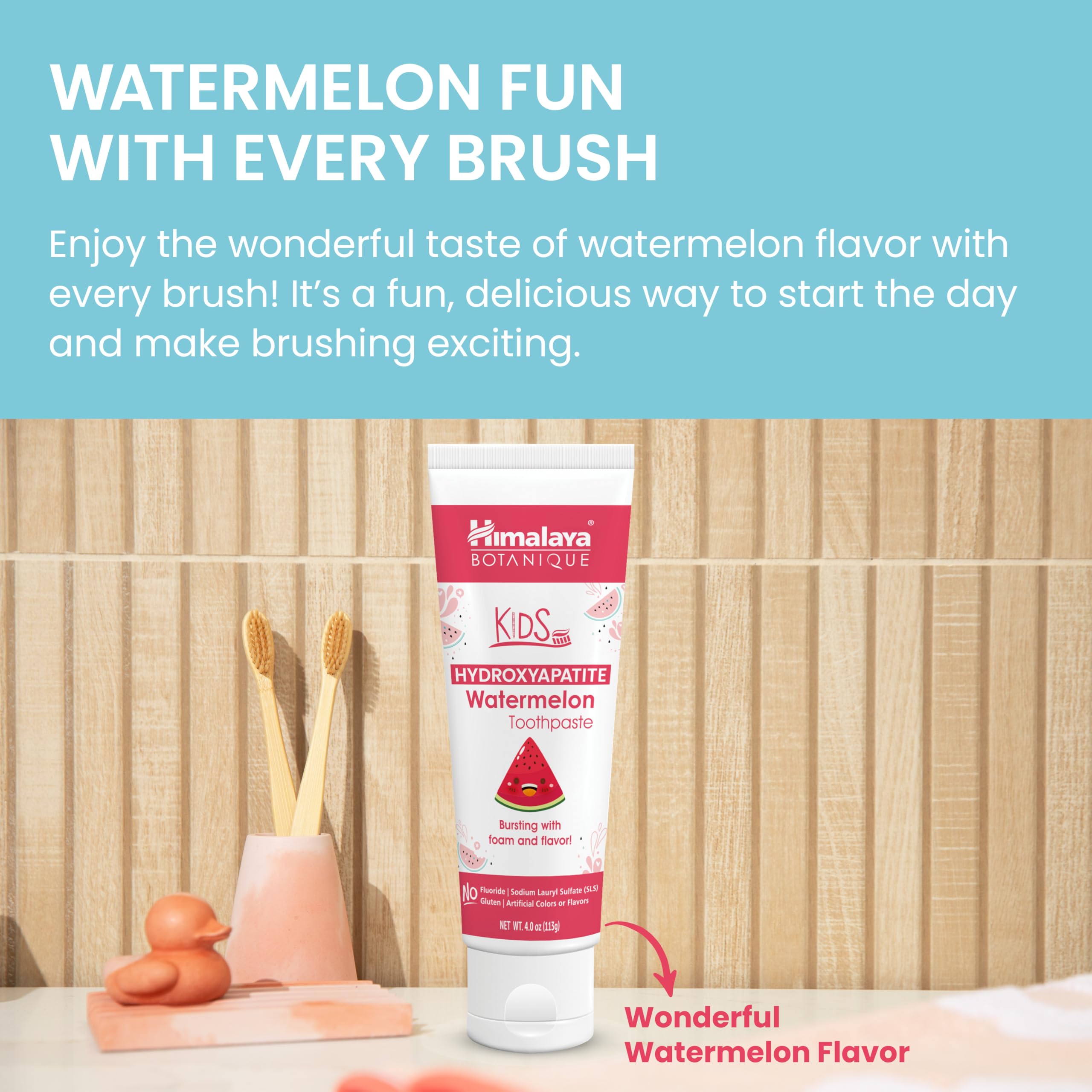 Smiling child after brushing with watermelon flavored toothpaste