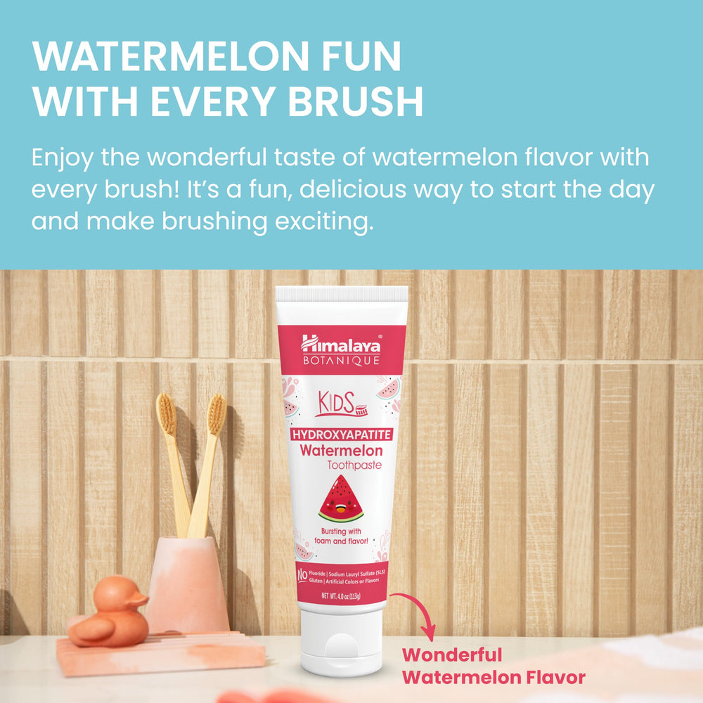 Smiling child after brushing with watermelon flavored toothpaste